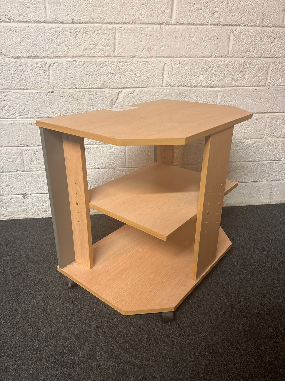 Beech laminate tv unit with storage space on castors 1325