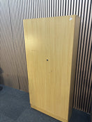 Tall maple 2 door storage unit with internal wooden shelves and key 95Wx160Hx60D. Price inc VAT