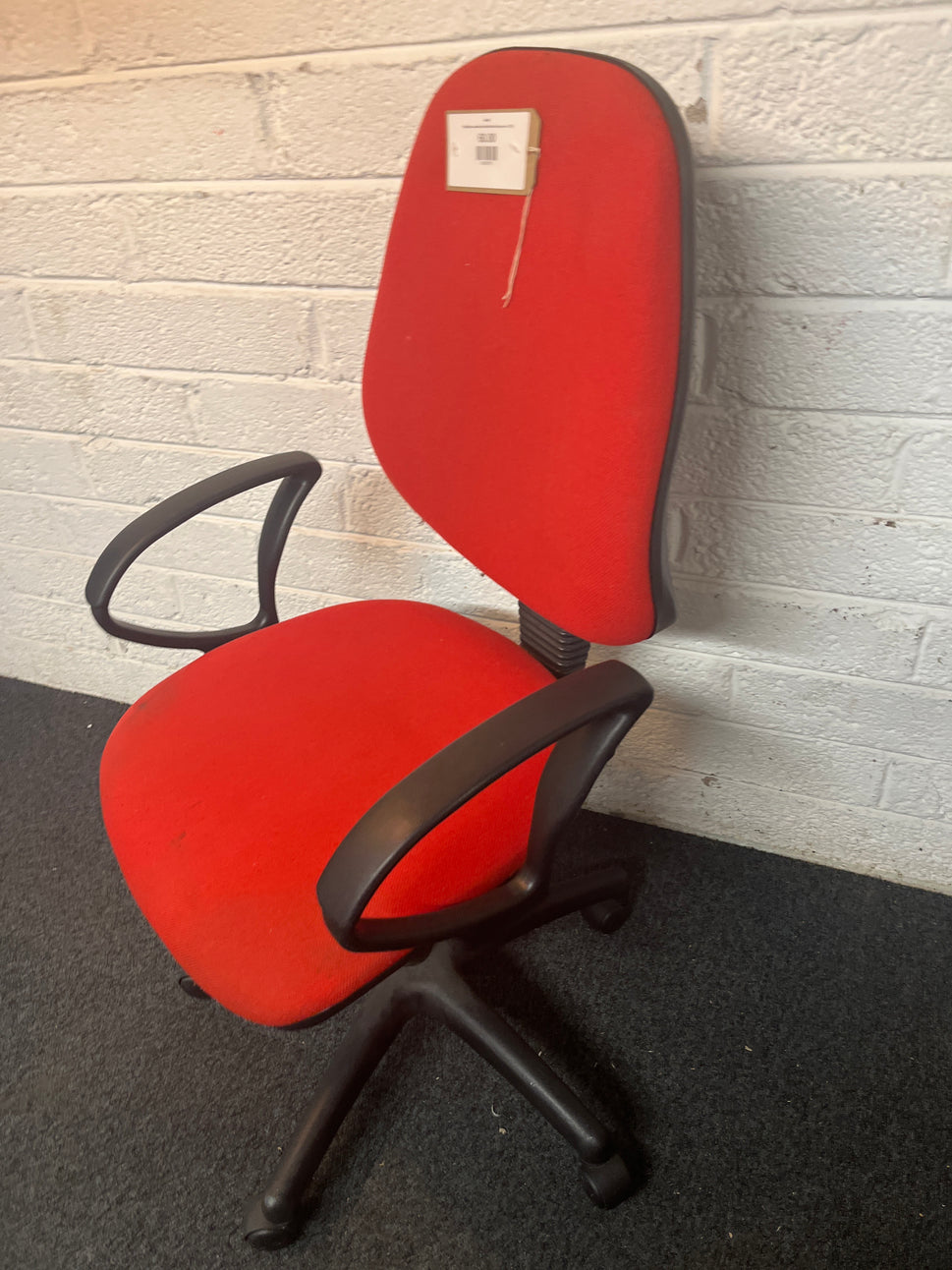 Red fabric swivel chair with black loop arms 1325