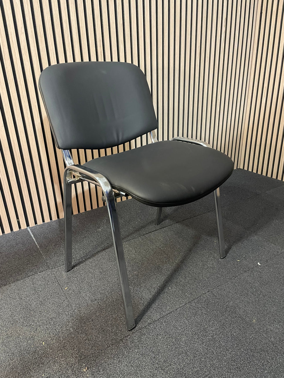 Chrome frame stackable chair black Eco leather