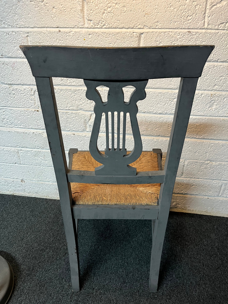 Grey painted ornate dining chair with rattan seat. 6 matching in stock. Can be sold as a set or individually 3225