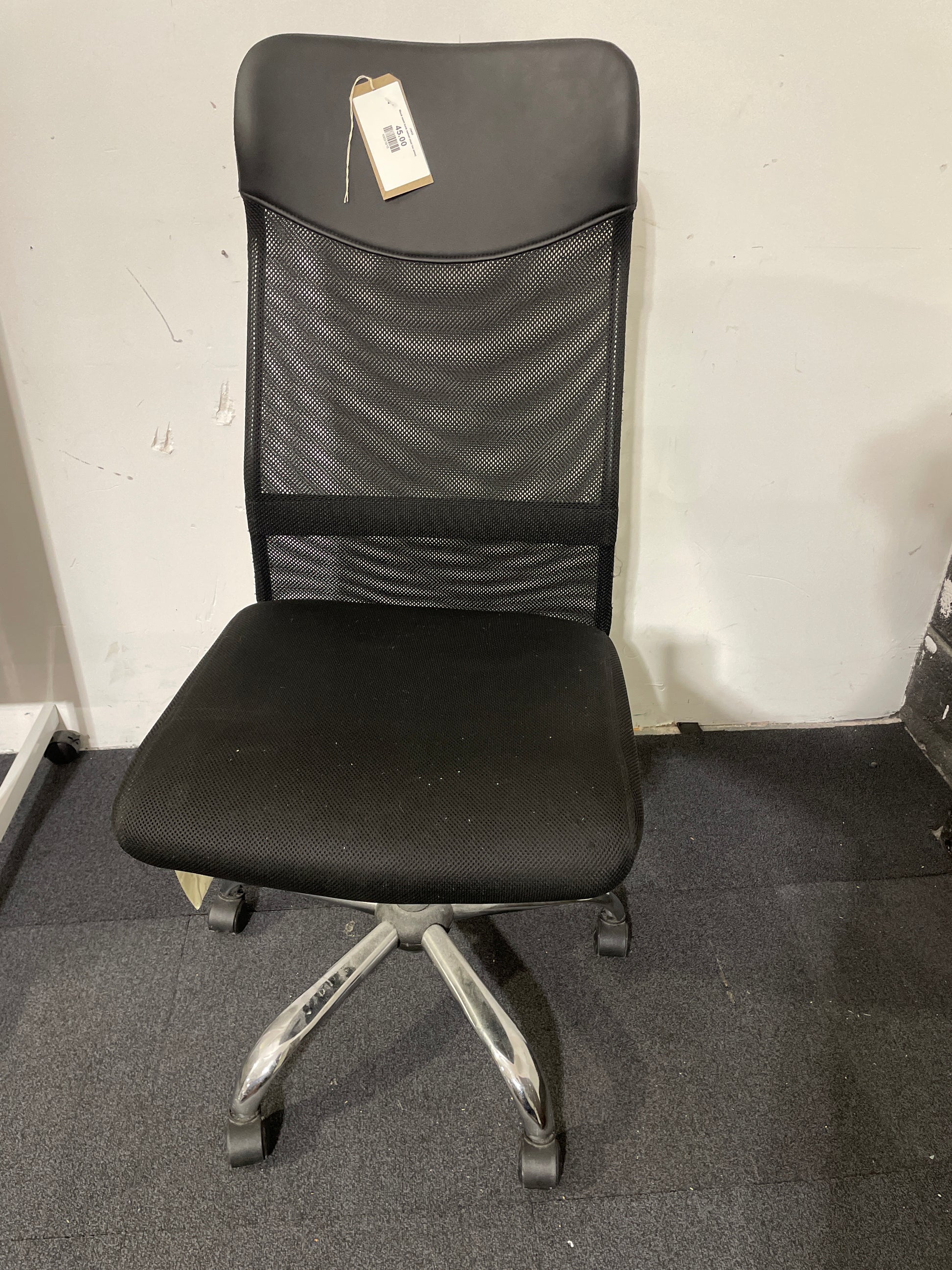 Black mesh back swivel chair (no arms)