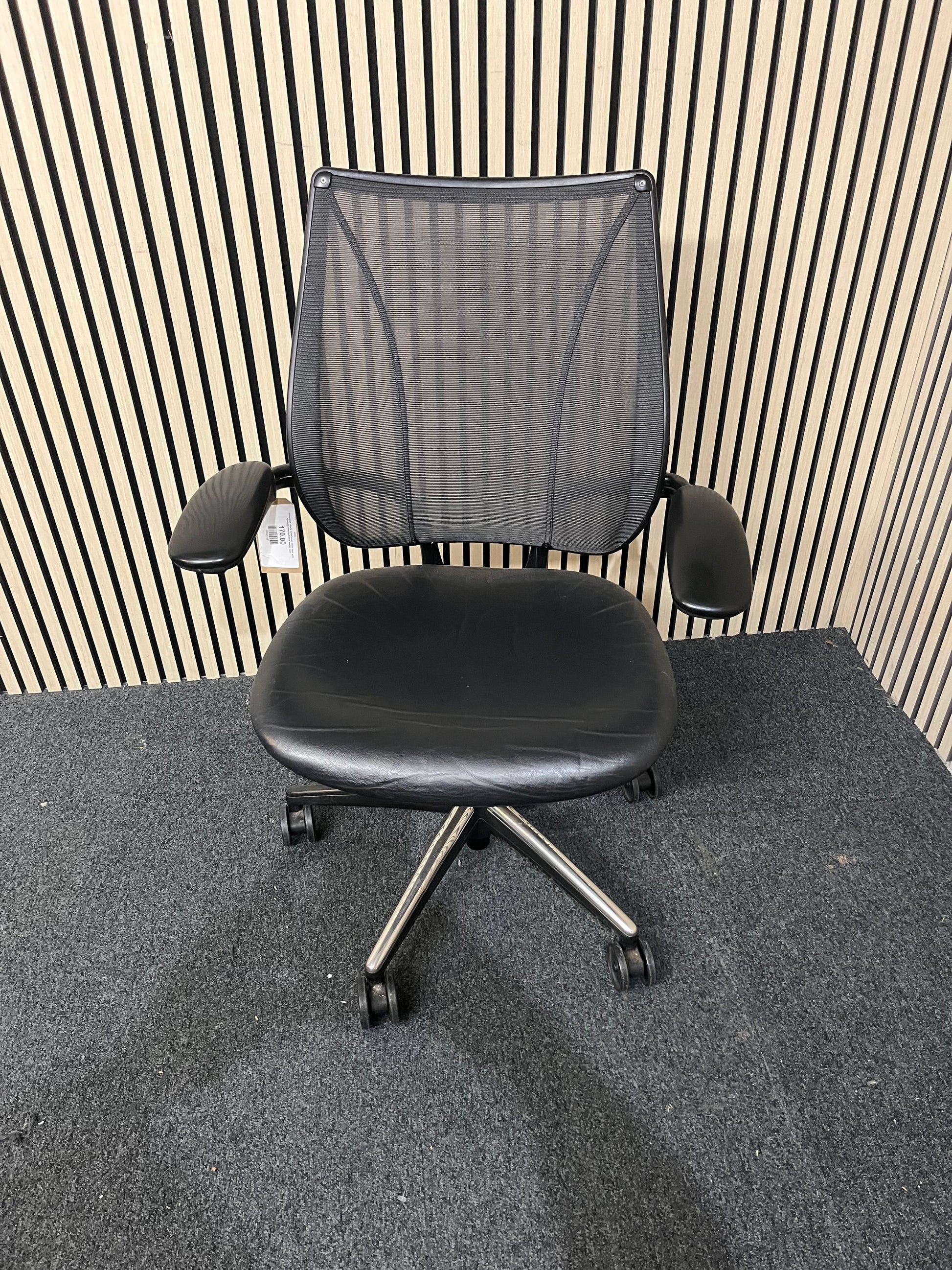 Humanscale Liberty swivel chair, mesh back with adjustable arms and black leather seat