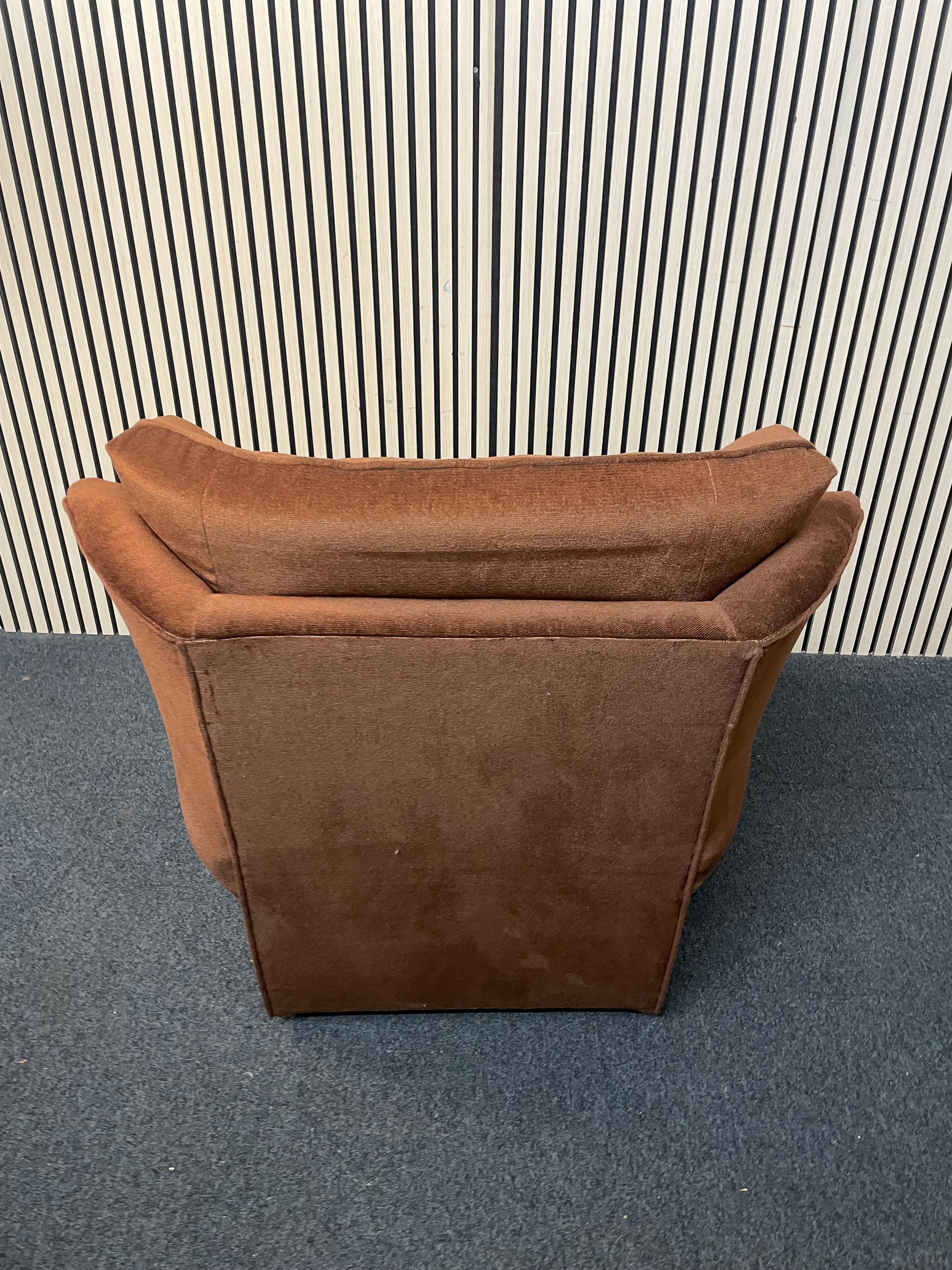 Brown fabric button back fireside armchair on castors 2425