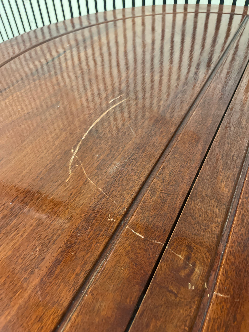 Dark stained hardwood circular 4 legged dining table (113 cm diameter) 3325