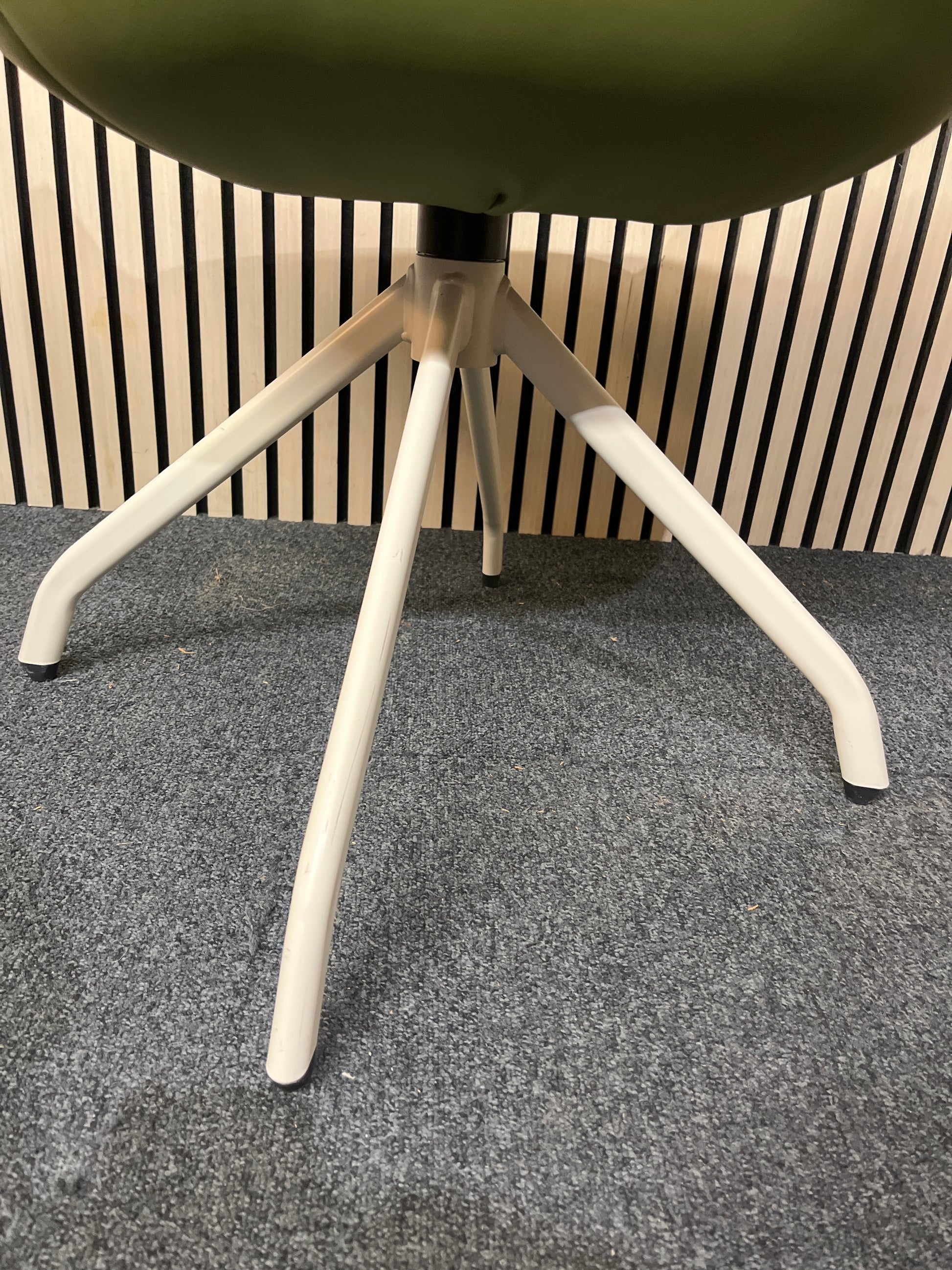 Olive green leatherette reception club chair with padded cushion and white spider swivel base 1425