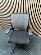 Humanscale Diffrient world black fabric seat, black mesh back swivel chair with adjustable arms swivel chair
