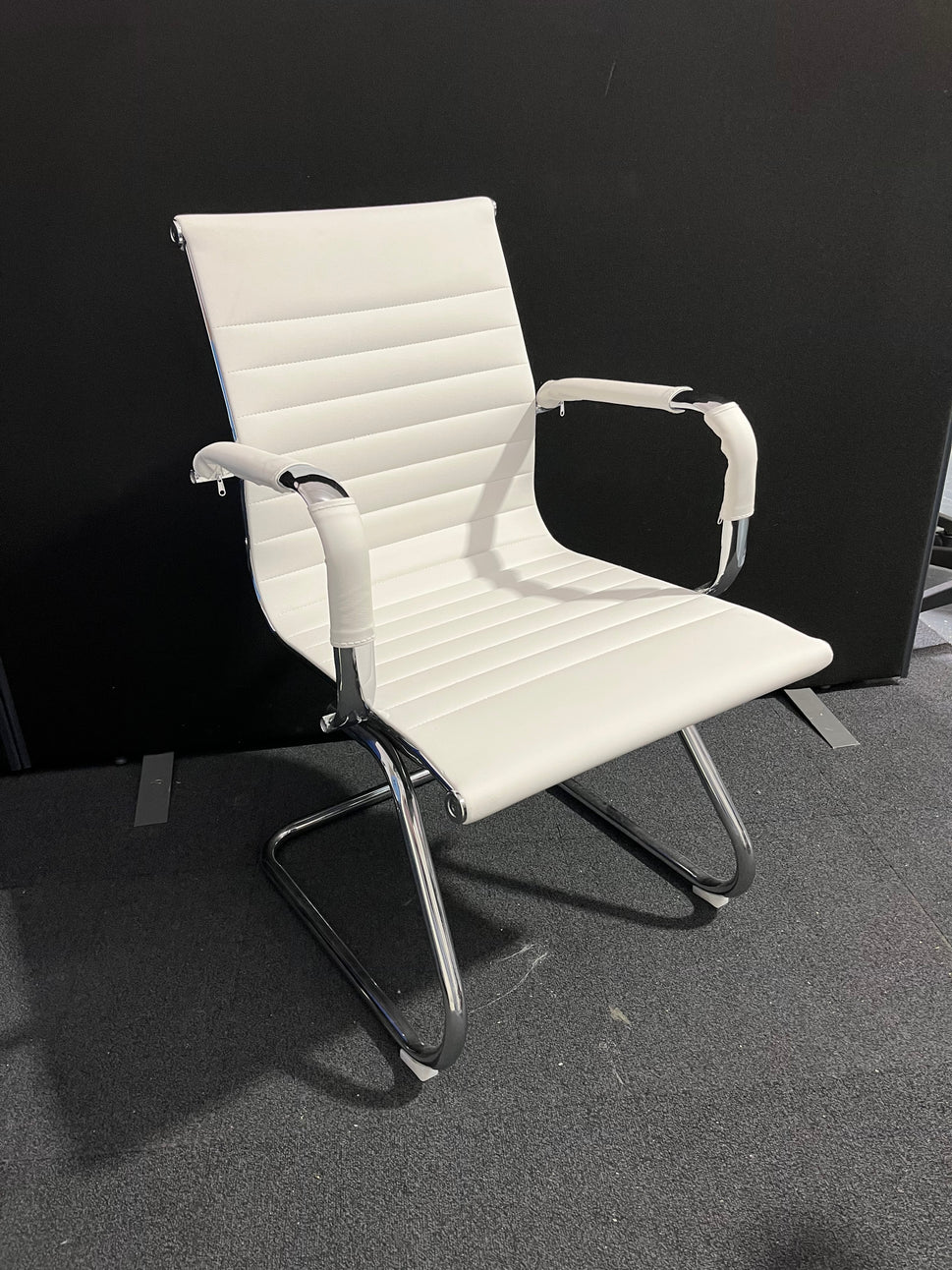 Cream leather chrome framed cantilever meeting chair