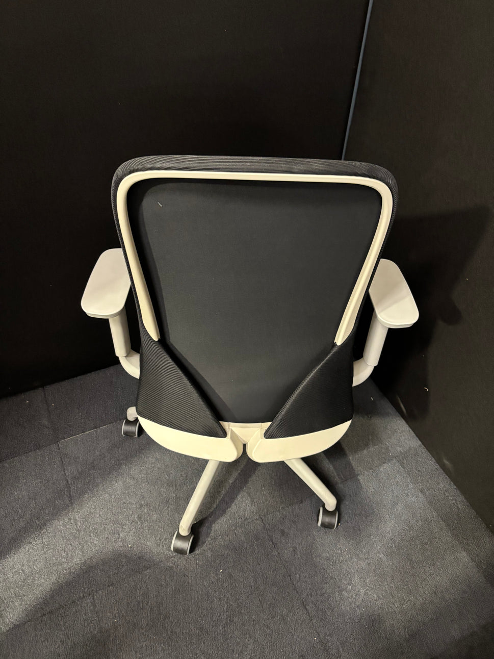 Sway black mesh back adjustable operator chair with black fabric seat, grey frame and base