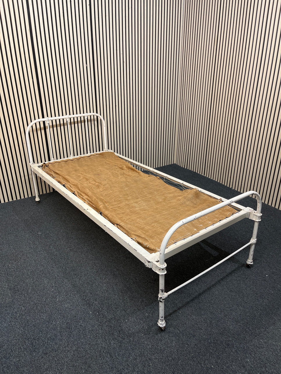 Antique white metal day bed on castors 1126