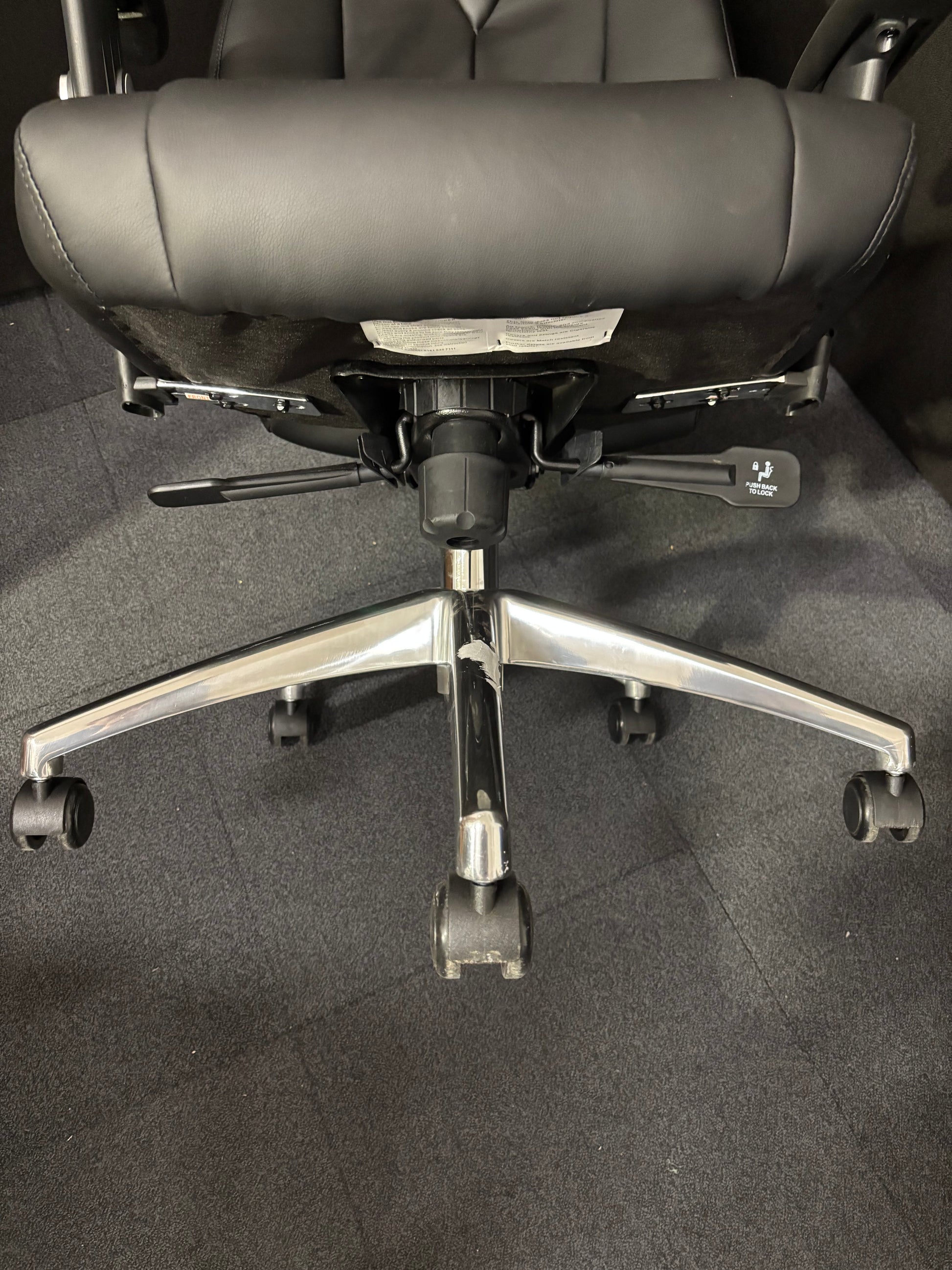 Odessa liquidated high back executive chair - black faux leather, polished metal base, height adjustable arms, price inc vat