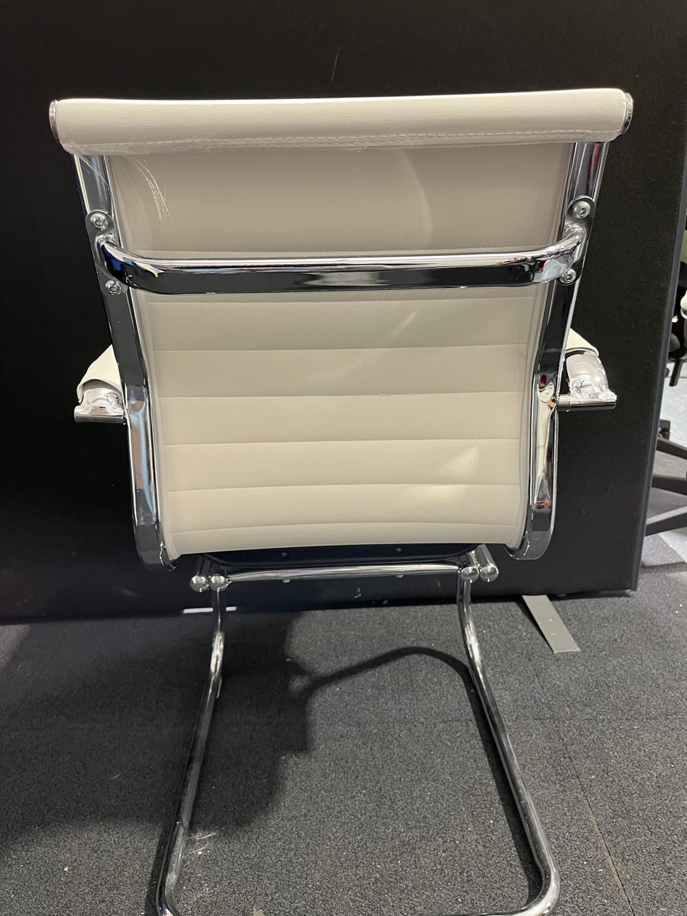 Cream leather chrome framed cantilever meeting chair