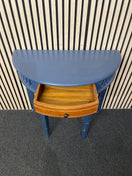 Half-moon wooden hallway table with a small central drawer. 44404