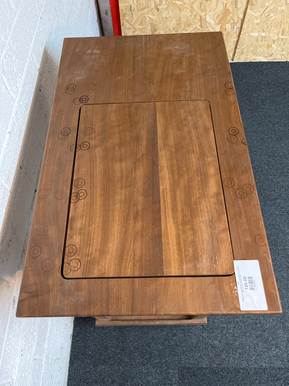 Stained pine high table with circular designs on castors (H 92 x W 90 x D 55 cm) 1325