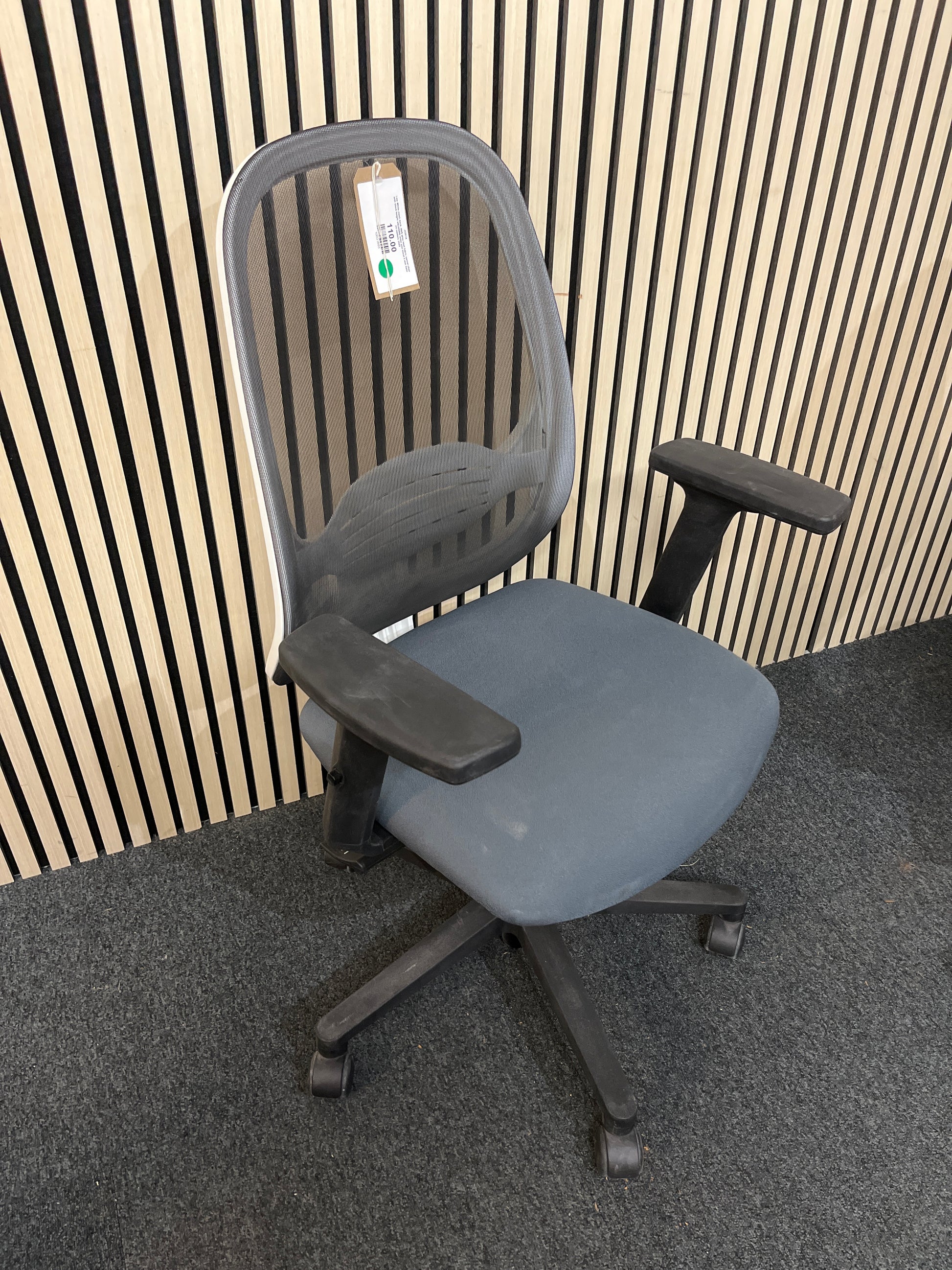 Low White mesh back, dark grey seat fabric swivel chair with black height adjustable arms and metal 5 star base on castors 1425