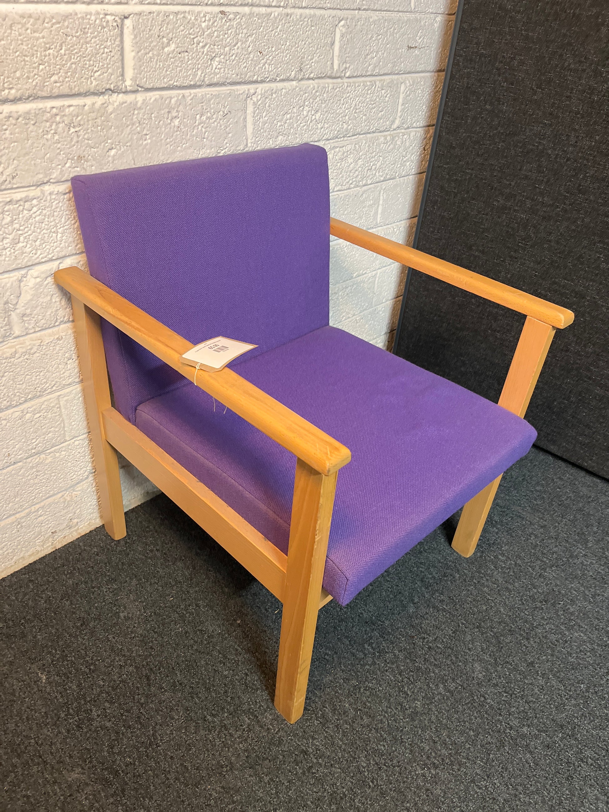 Purple fabric beech framed low reception armchair
