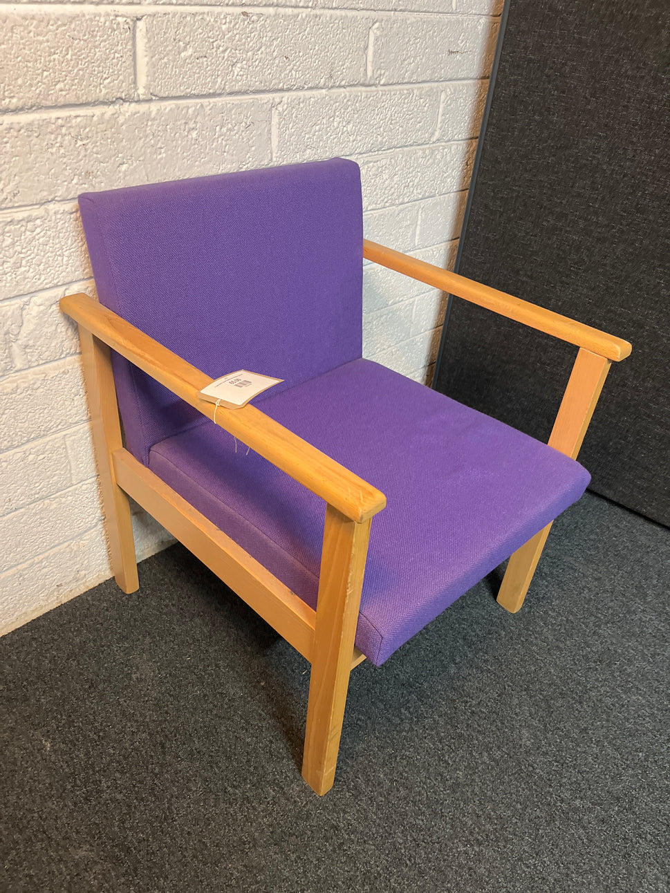 Purple fabric beech framed low reception armchair