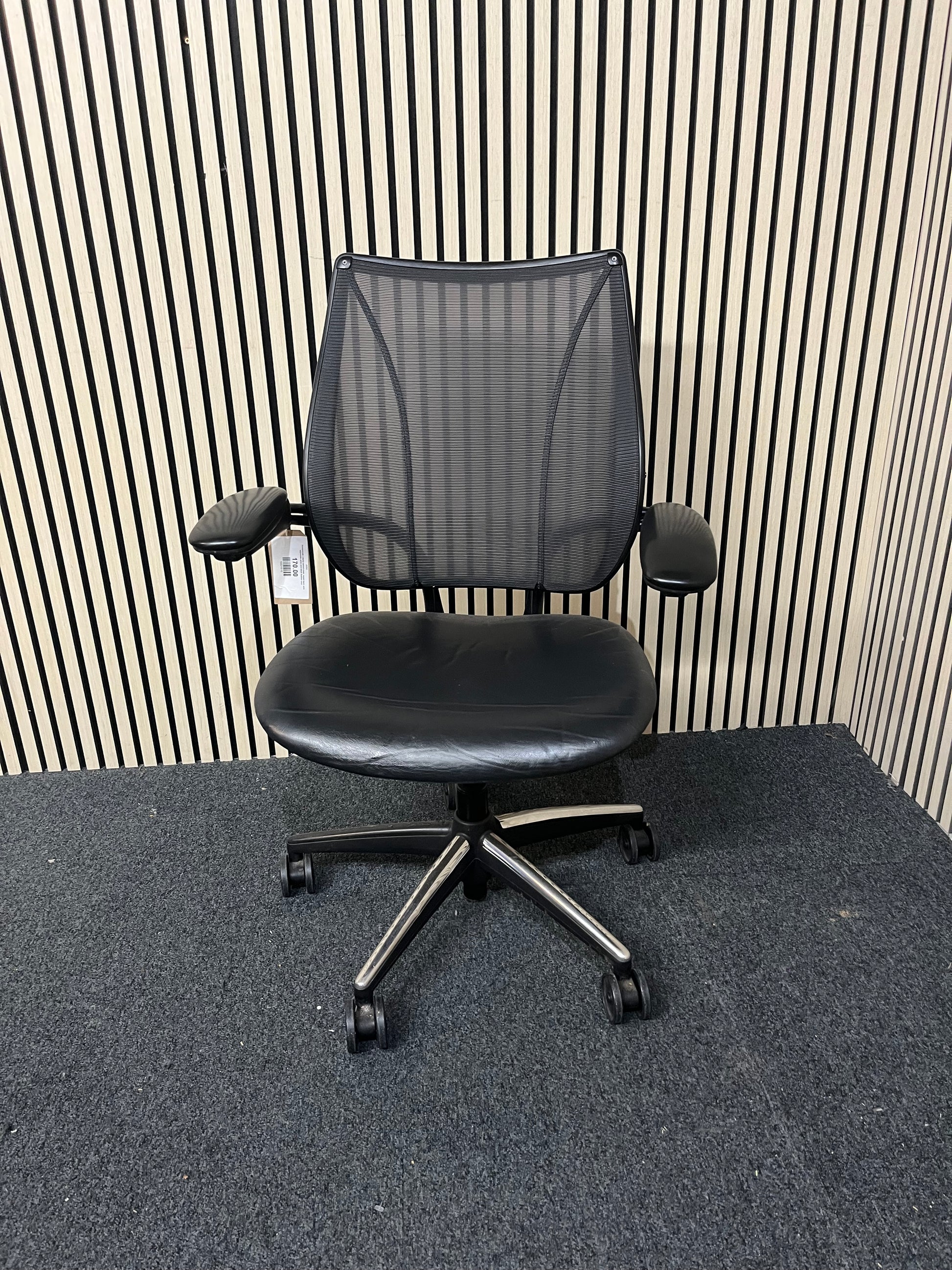 Humanscale Liberty swivel chair, mesh back with adjustable arms and black leather seat