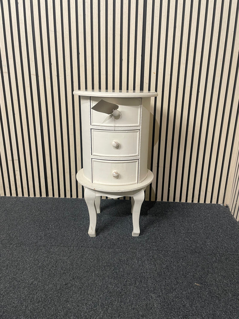 Oval three-drawer bedside locker with cabriole legs and cream finish. 44701