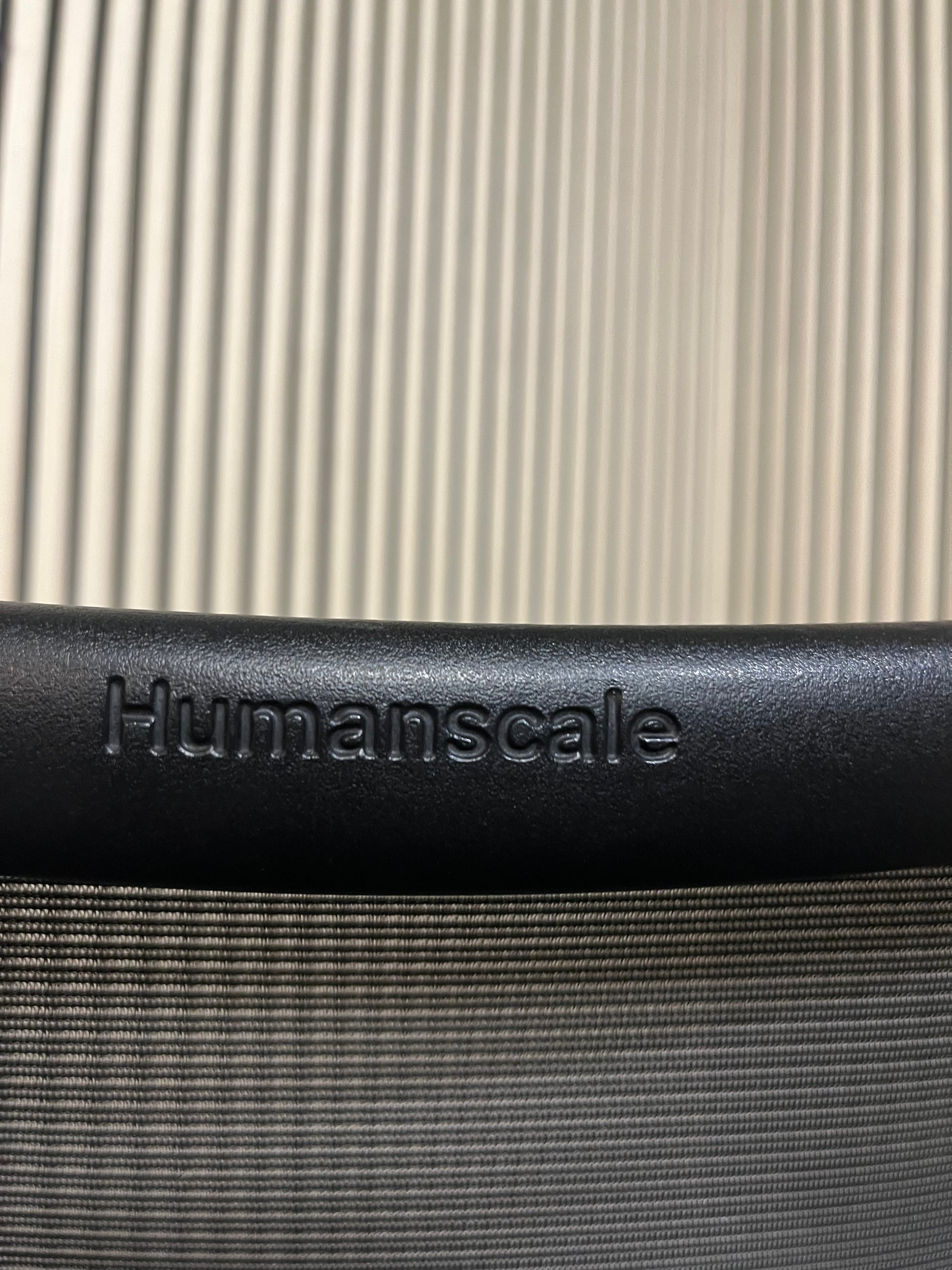 Humanscale Liberty swivel chair, mesh back with adjustable arms and black leather seat