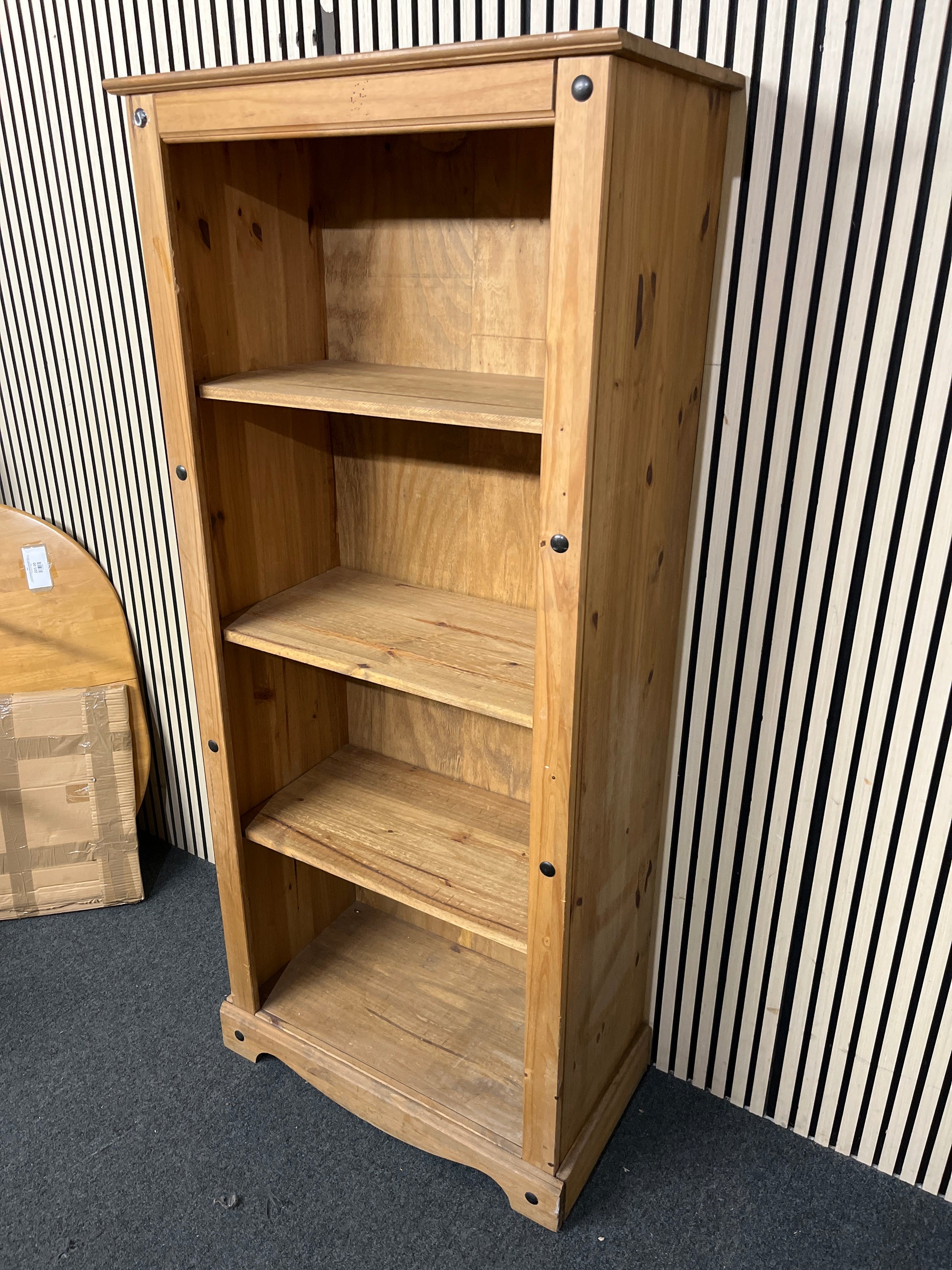 Rustic pine bookcase frame with black stud details, 184 83 43 44147