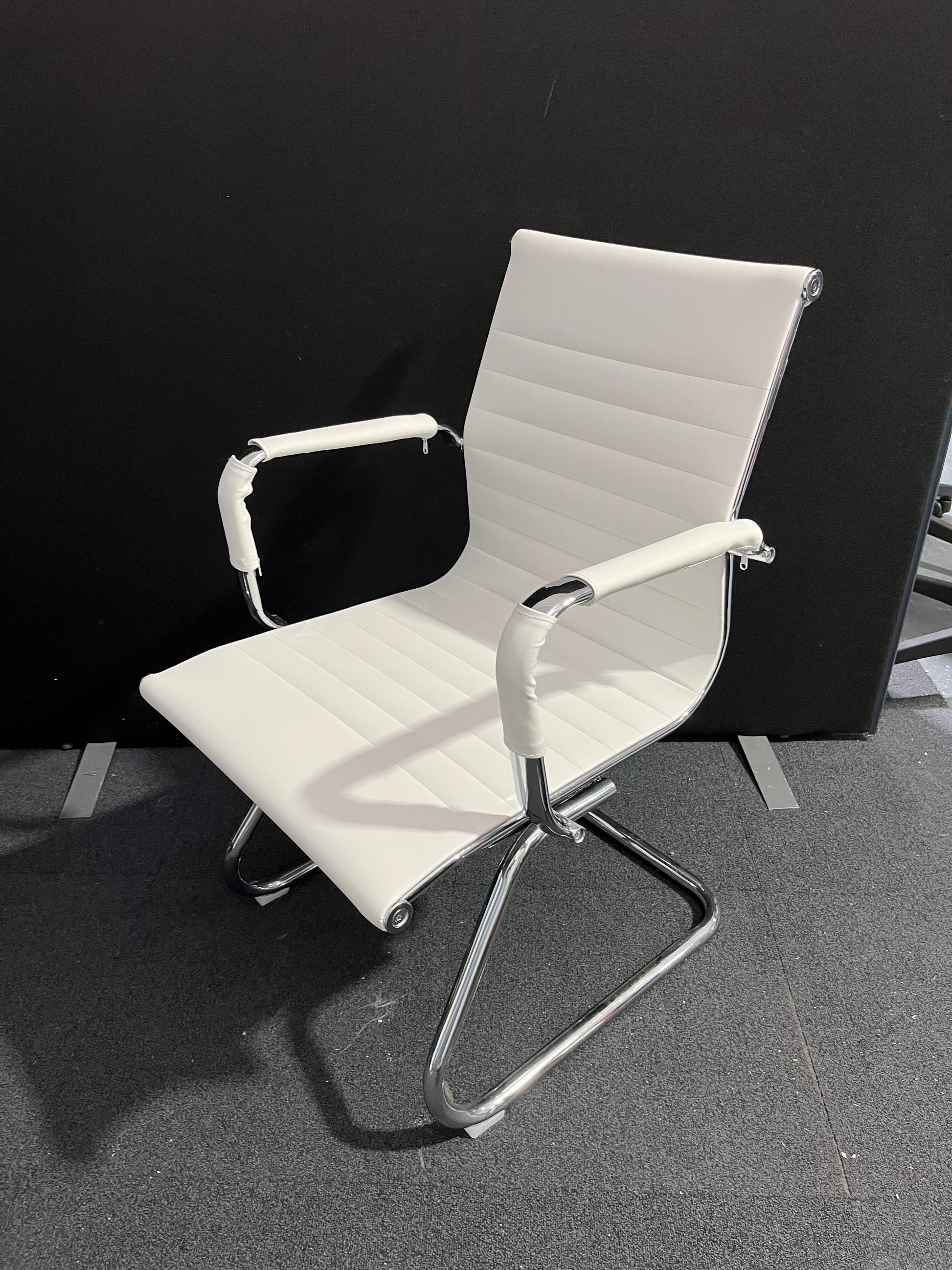 Cream leather chrome framed cantilever meeting chair