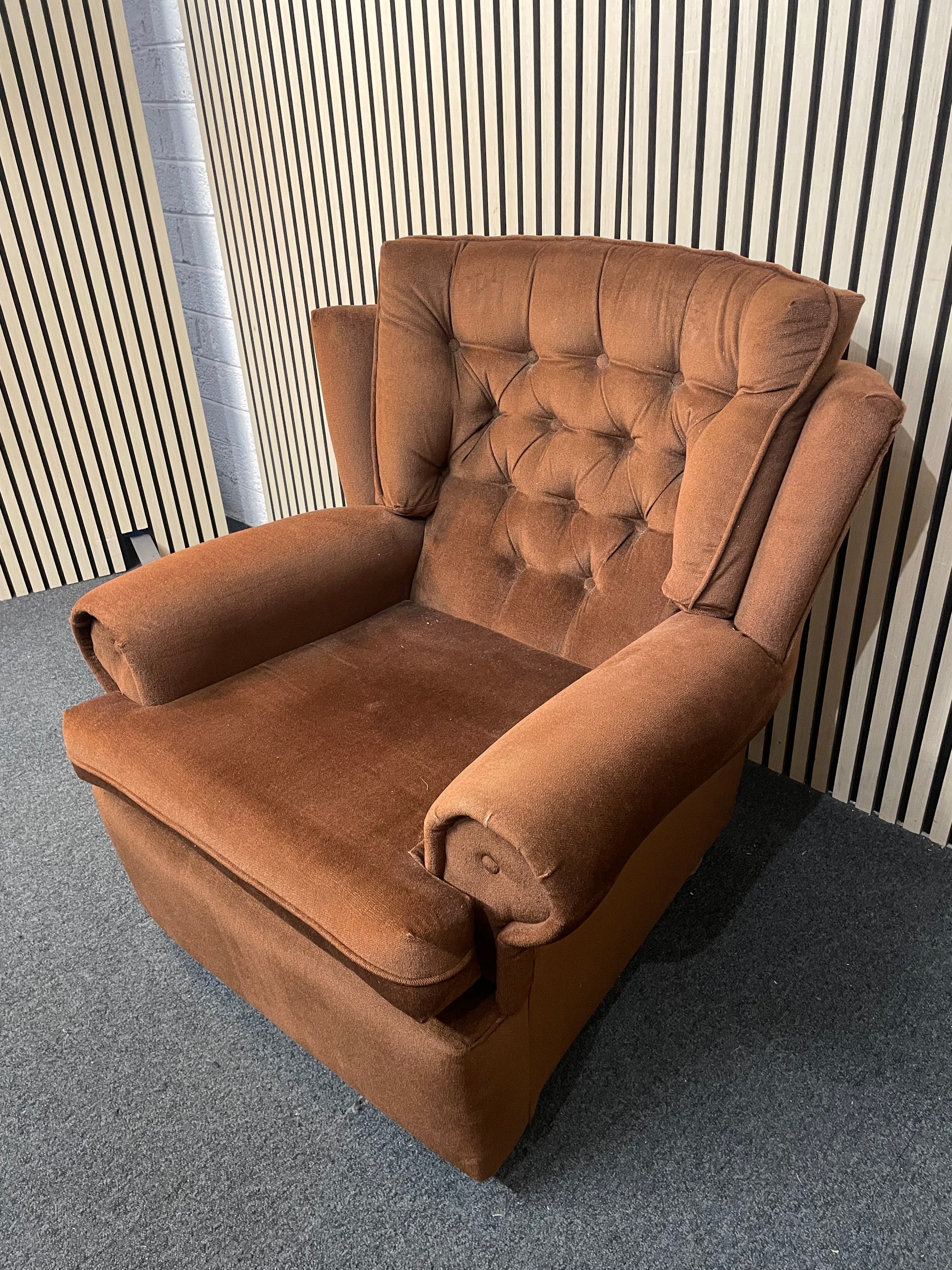Brown fabric button back fireside armchair on castors 2425