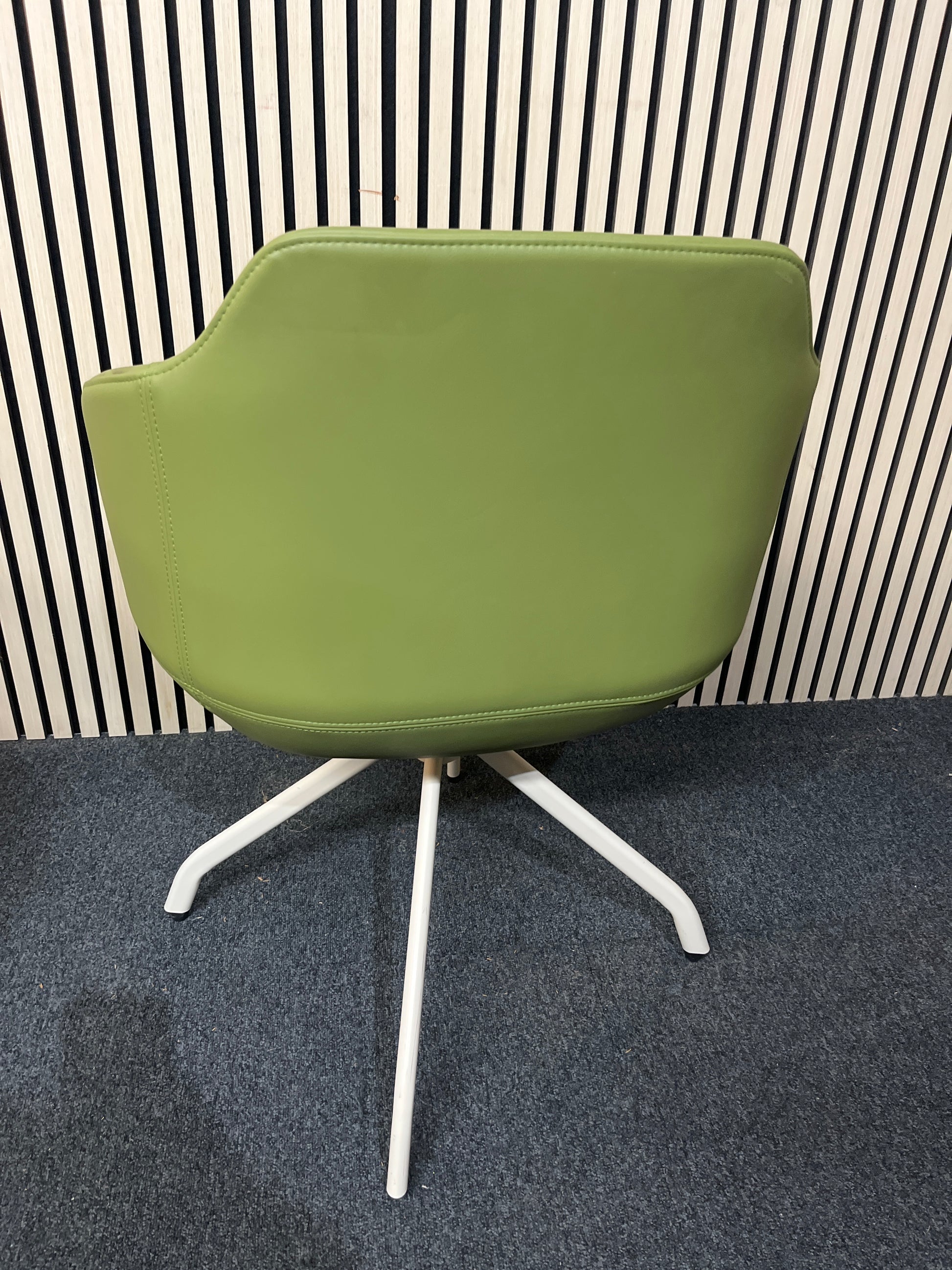 Olive green leatherette reception club chair with padded cushion and white spider swivel base 1425
