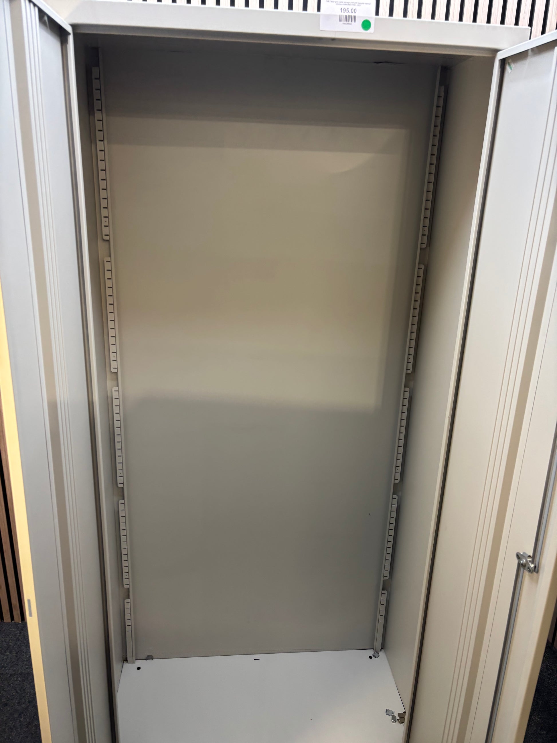 Tall 2 door grey metal storage uniit with key and internal shelves 910Wx40Dx195H J3937
