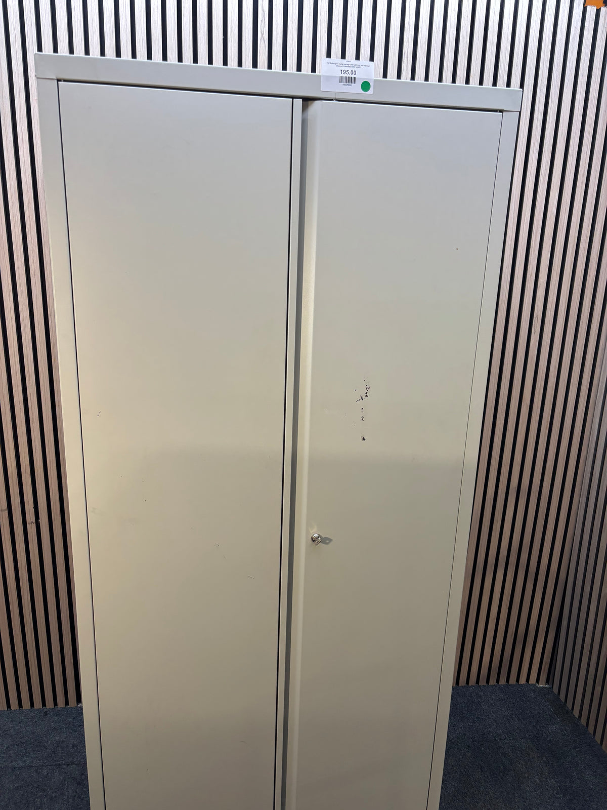 Tall 2 door grey metal storage uniit with key and internal shelves 910Wx40Dx195H J3937