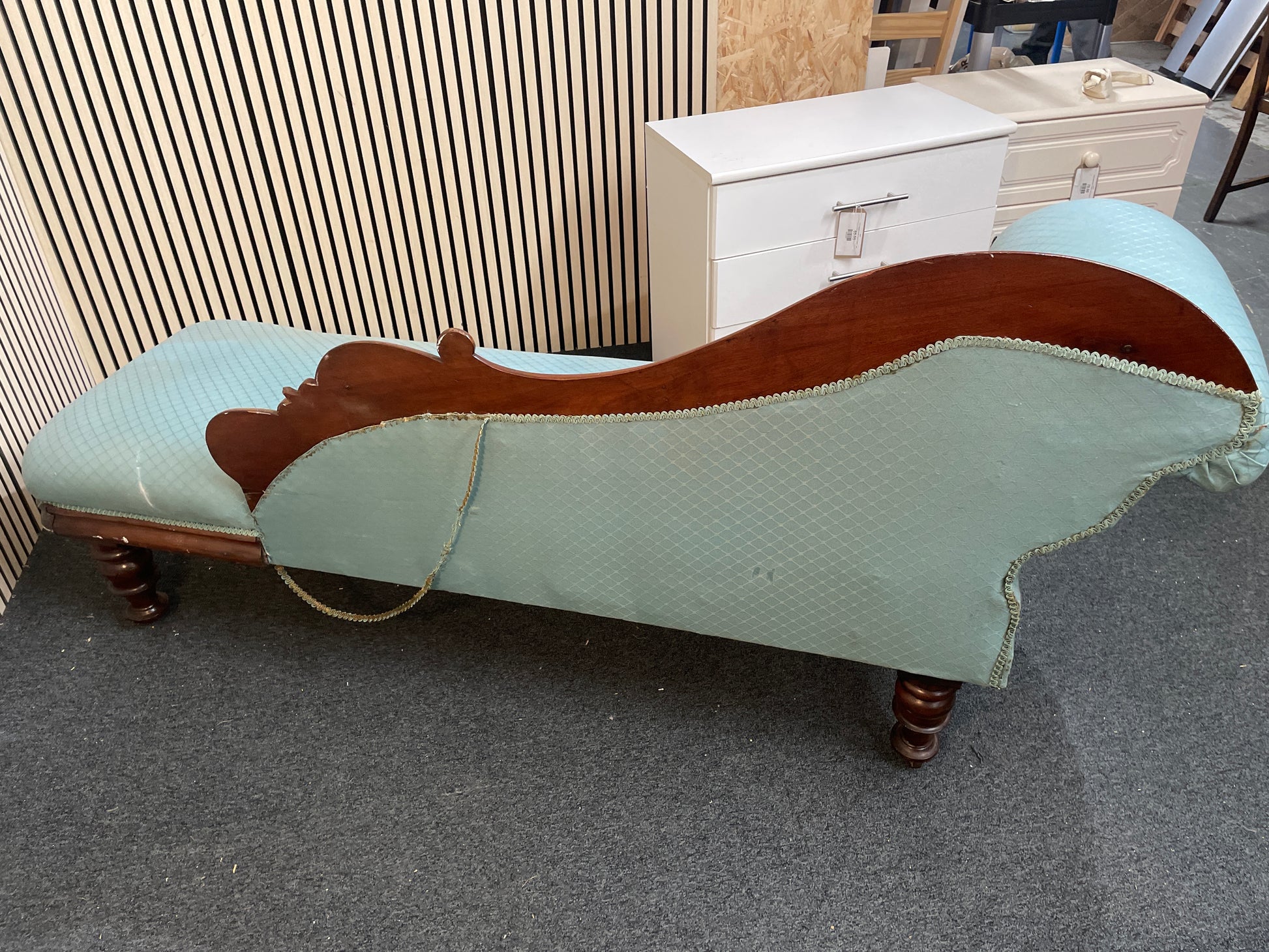 Ornate solid dark wood stained chaise lounge in green pastel fabric, ideal for upholstery 2425