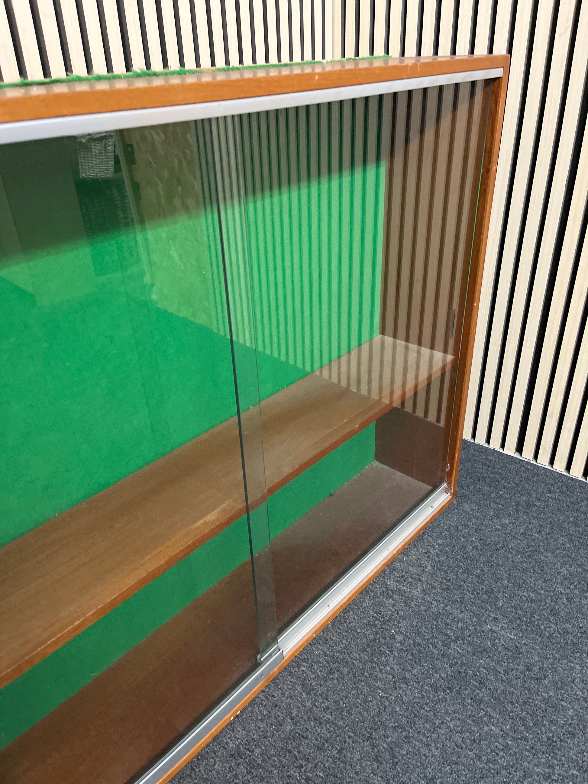 Large teak framed wall mounted glass display unit (H 92 x W 234 x D 24 cm)