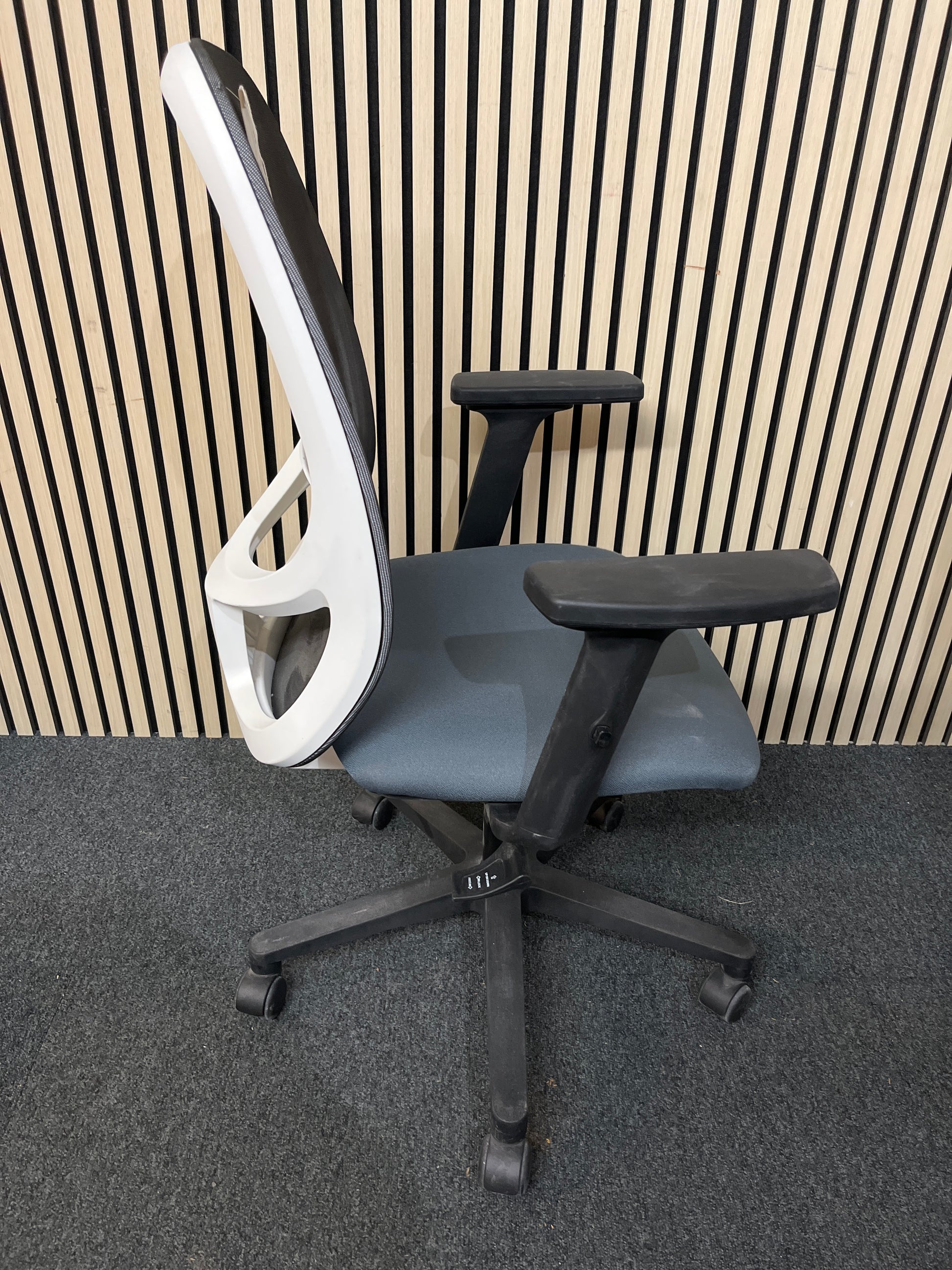 Low White mesh back, dark grey seat fabric swivel chair with black height adjustable arms and metal 5 star base on castors 1425
