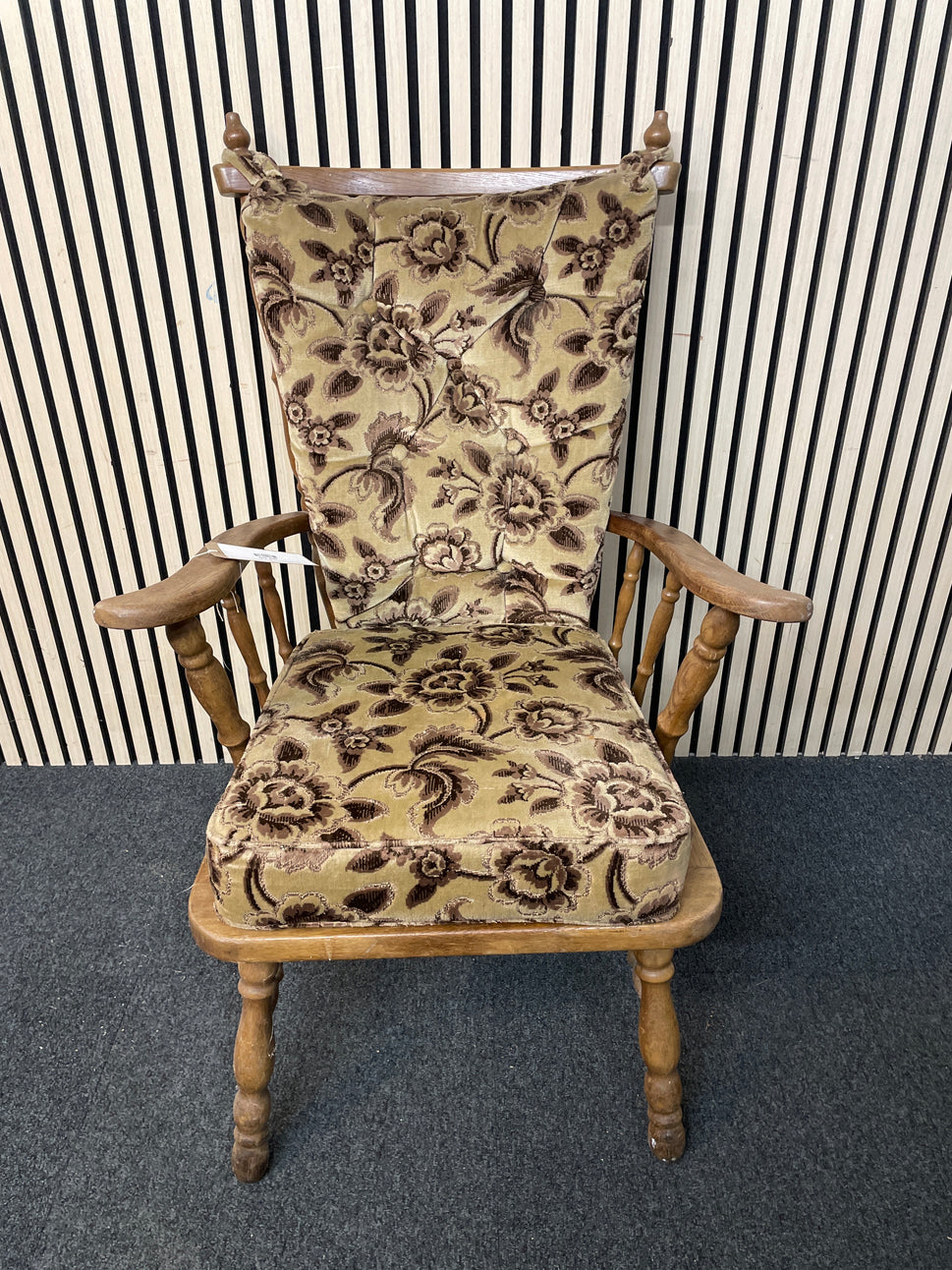 Oak stained fireside armchair with floral fabric cushions 2425