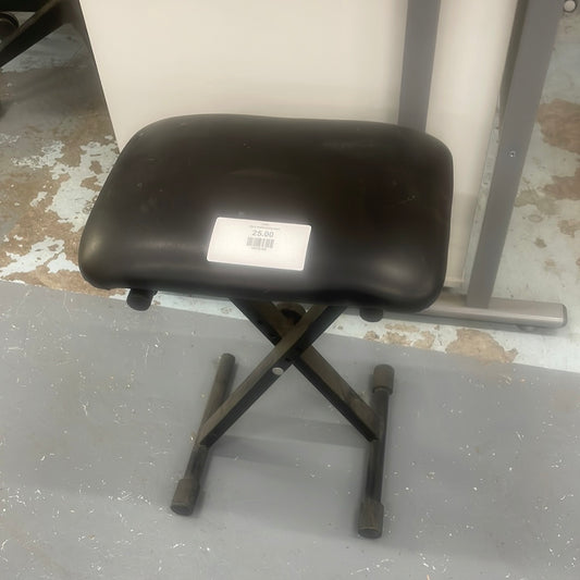 Black leather piano stool