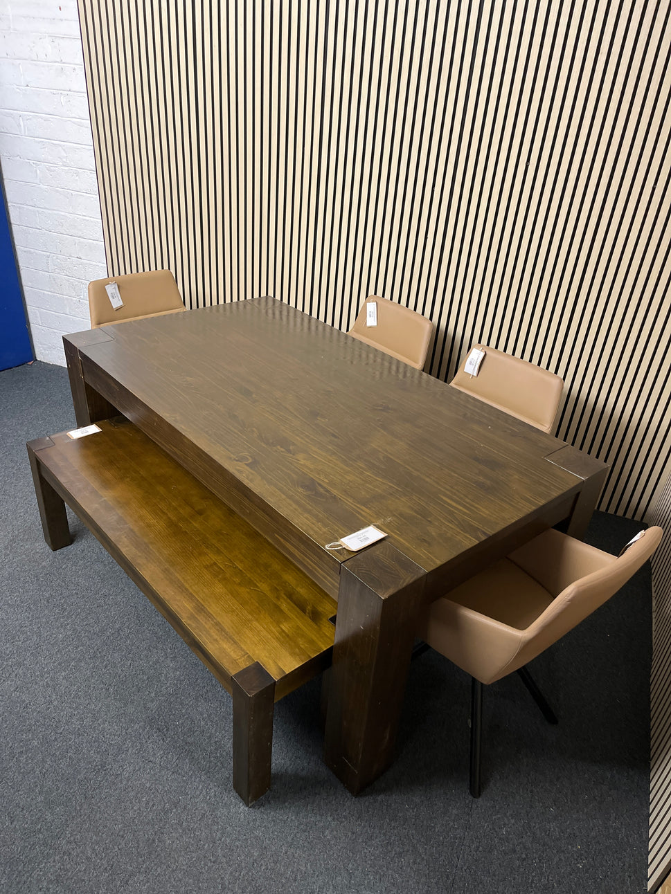 Large solid dark wood stained rectangular dining table (L180 W100 H79 cm) with matching bench and 4 no. tripod base salmon leather seats 1325