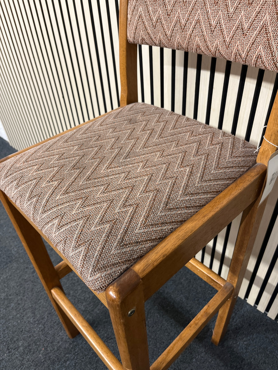 Solid stained rubberwood high back bar stool with brown mix fabric seat cushion