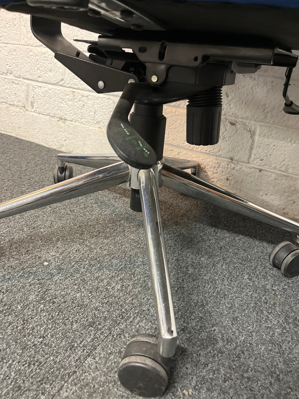 Secondhand High back, dark blue fabric swivel chair, heavy duty with polished chrome base and height adjustable arms and back tensioner . PRICE INC VAT, 20+ IN STOCK