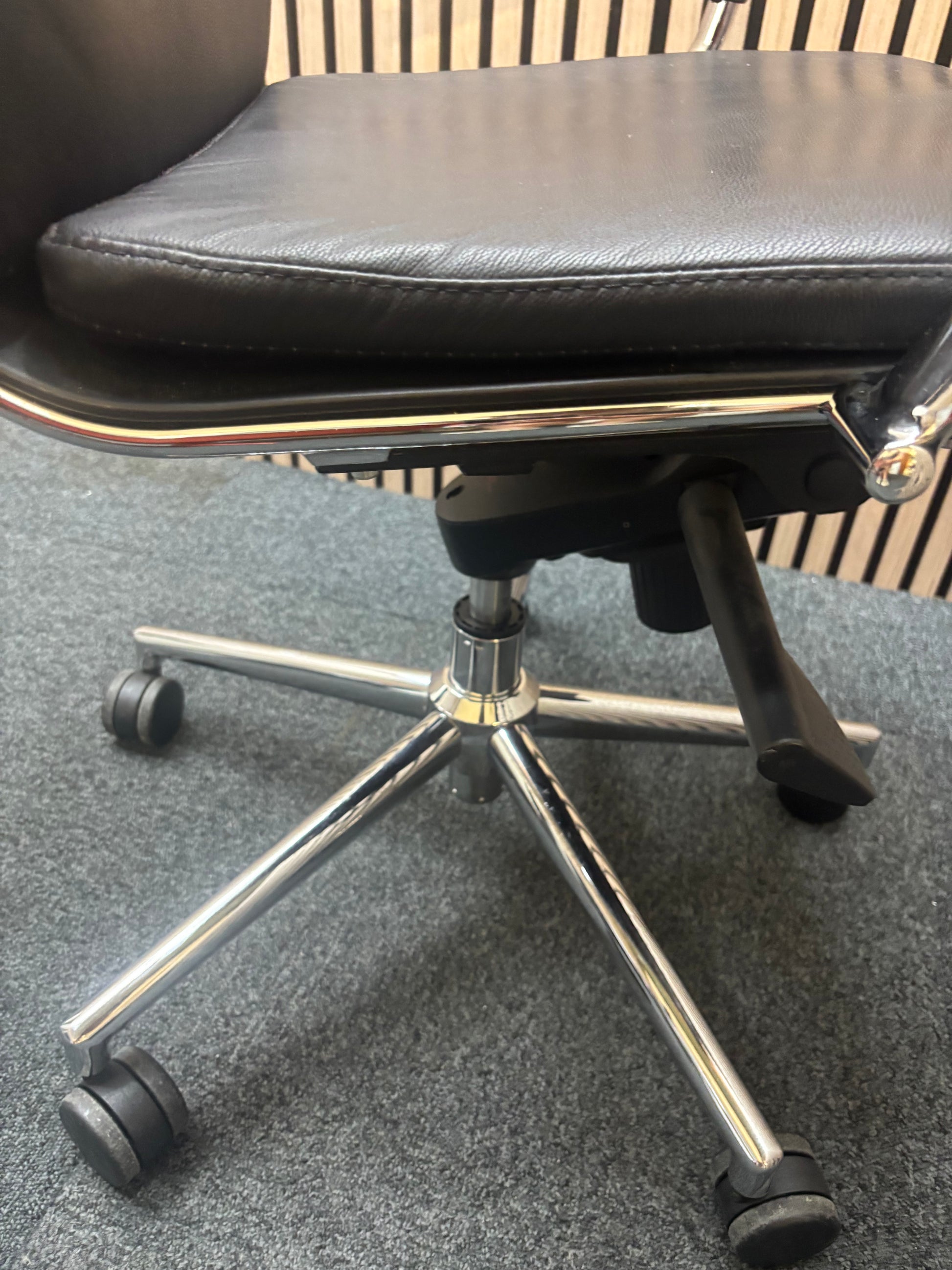 High back real black leather Eames style tall executive height adjustable swivel chair with polished chrome arms and base J3912
