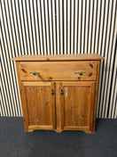 Rustic pine storage unit with top drawer and two doors. (H 90 x W 61 x D 31 cm) 44588