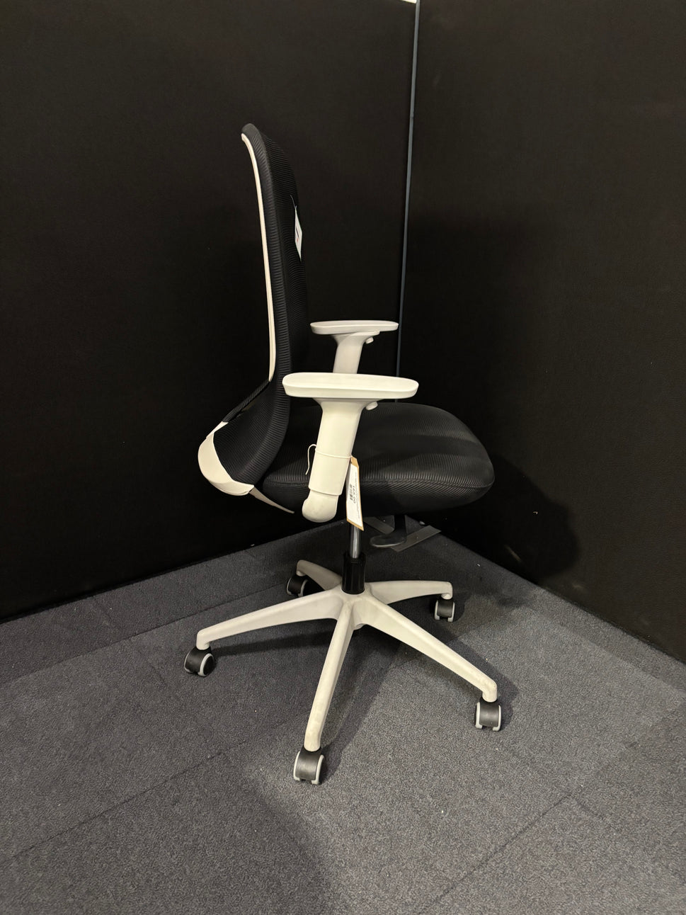 Sway black mesh back adjustable operator chair with black fabric seat, grey frame and base