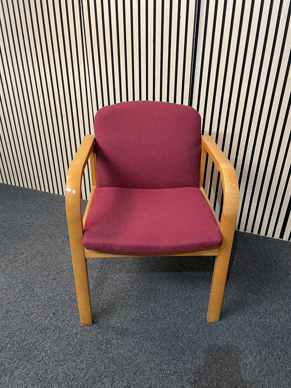 Solid beech framed meeting chair with arms in wine fabric seat and back