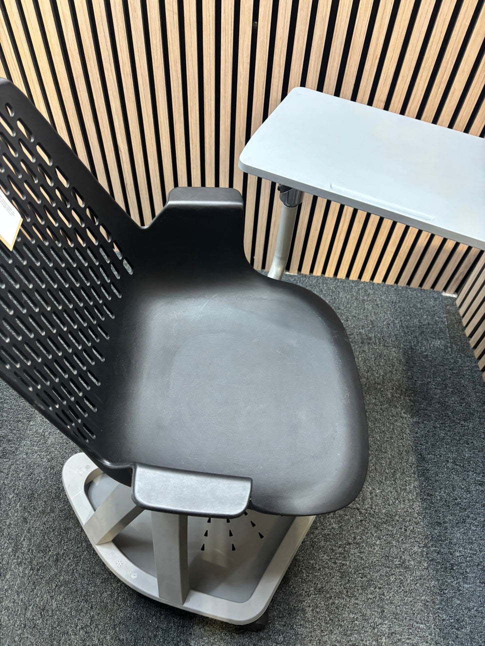 Report mobile conference chair with writing tablet on castors, black plastic seat, dark grey writing tablet with drinks holder. 90Hx64Wx59H. Seat height 445mm