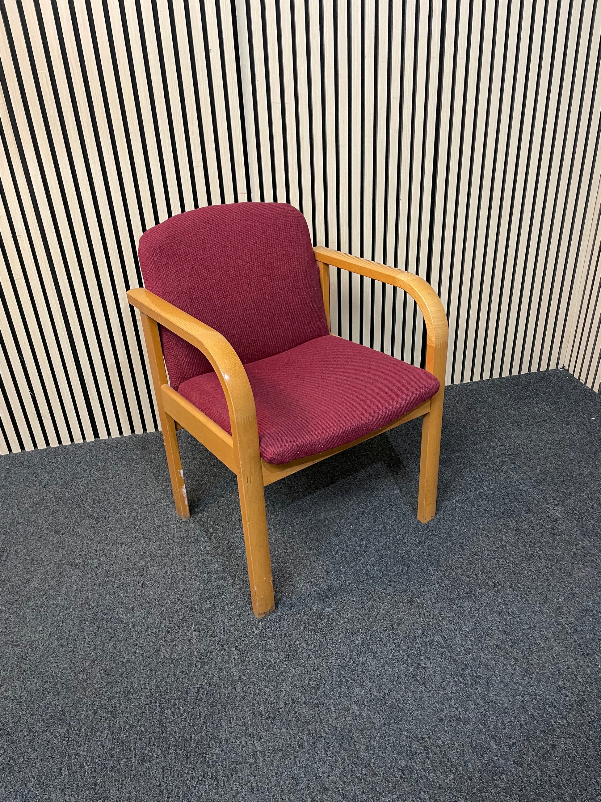 Solid beech framed meeting chair with arms in wine fabric seat and back