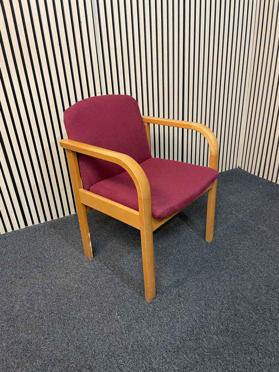 Solid beech framed meeting chair with arms in wine fabric seat and back