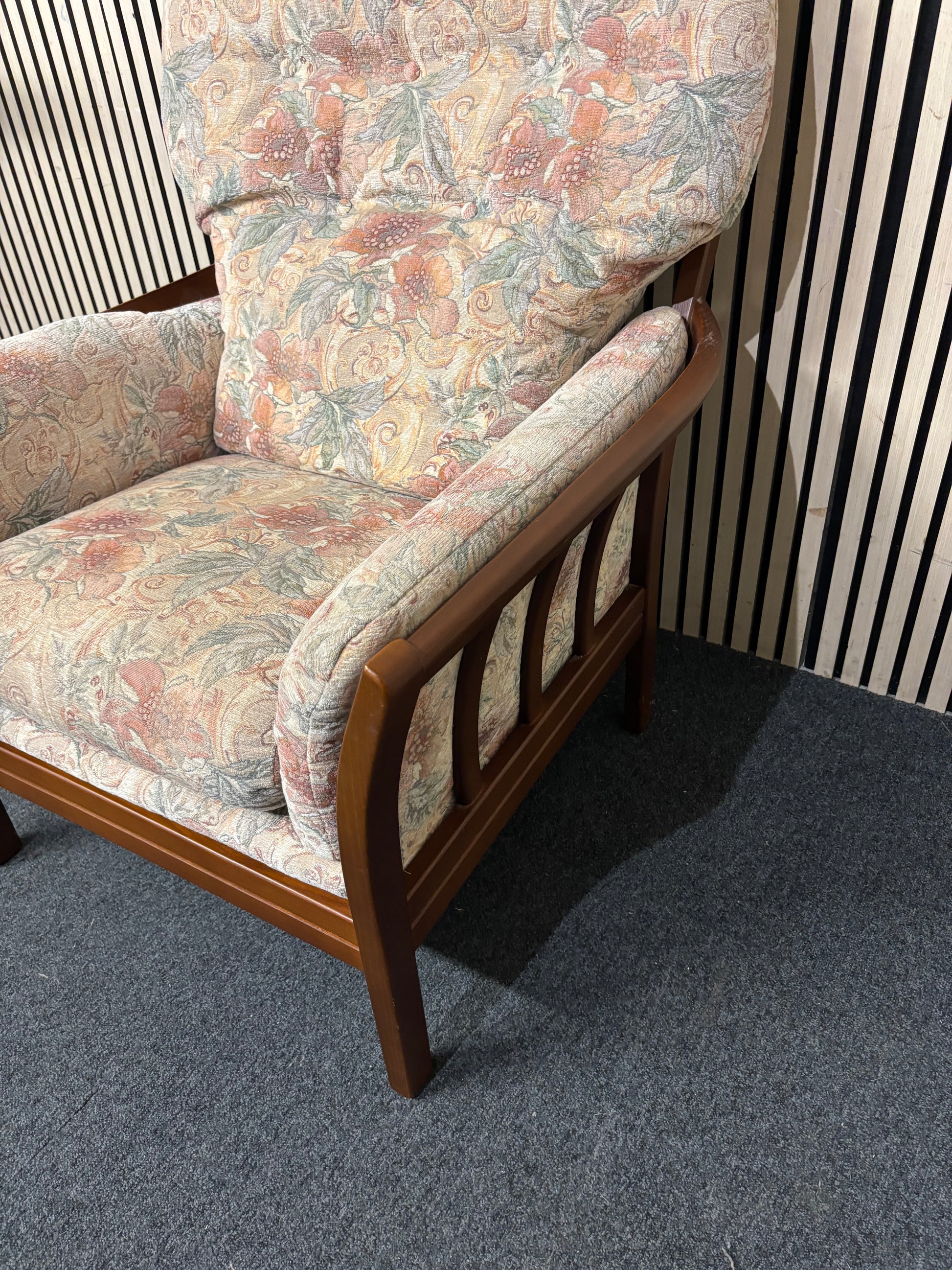 Traditional floral patterned armchair with solid dark wood frame 44228