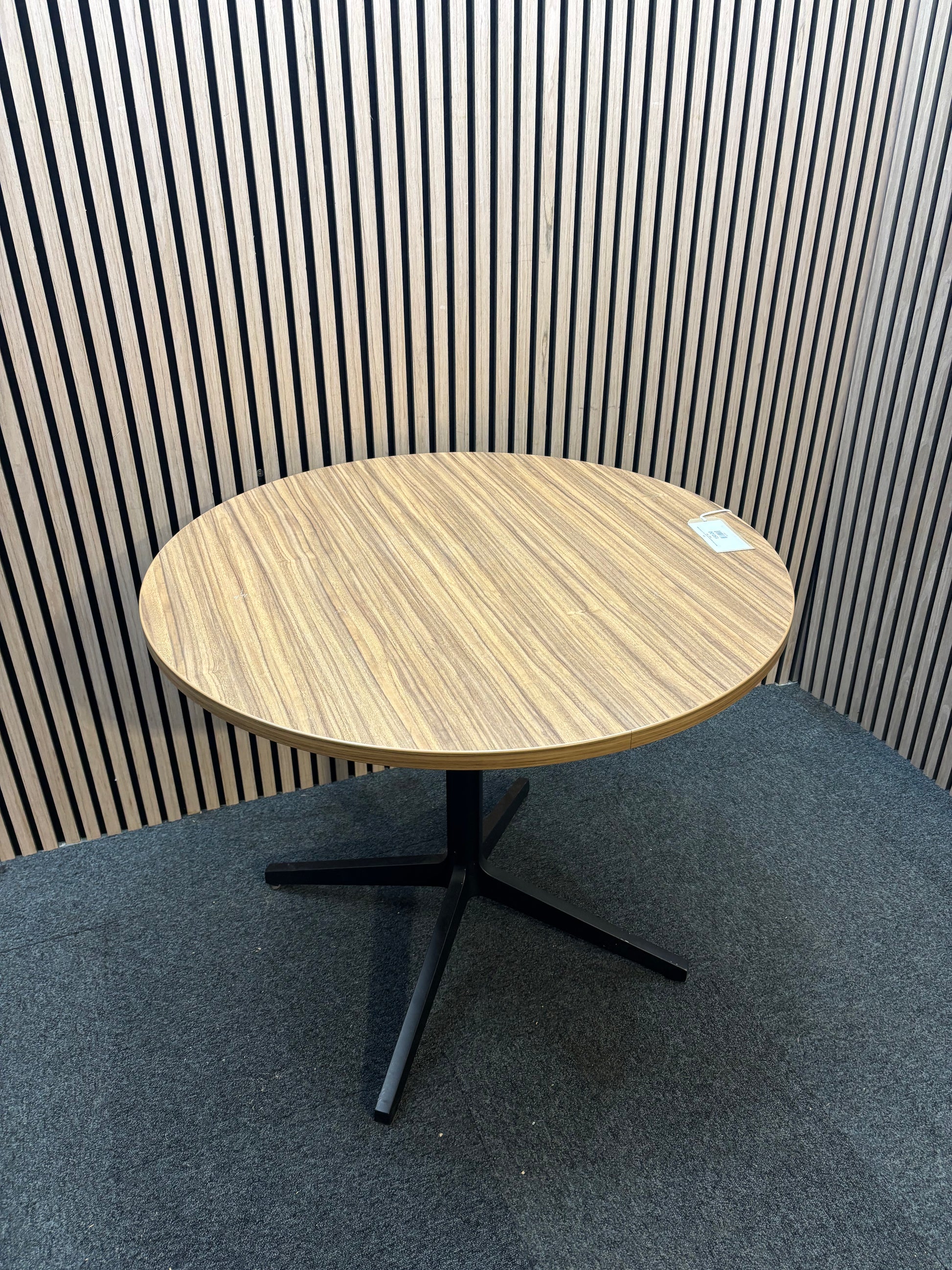 Round cafe table with wood-effect top and black metal base. J3943