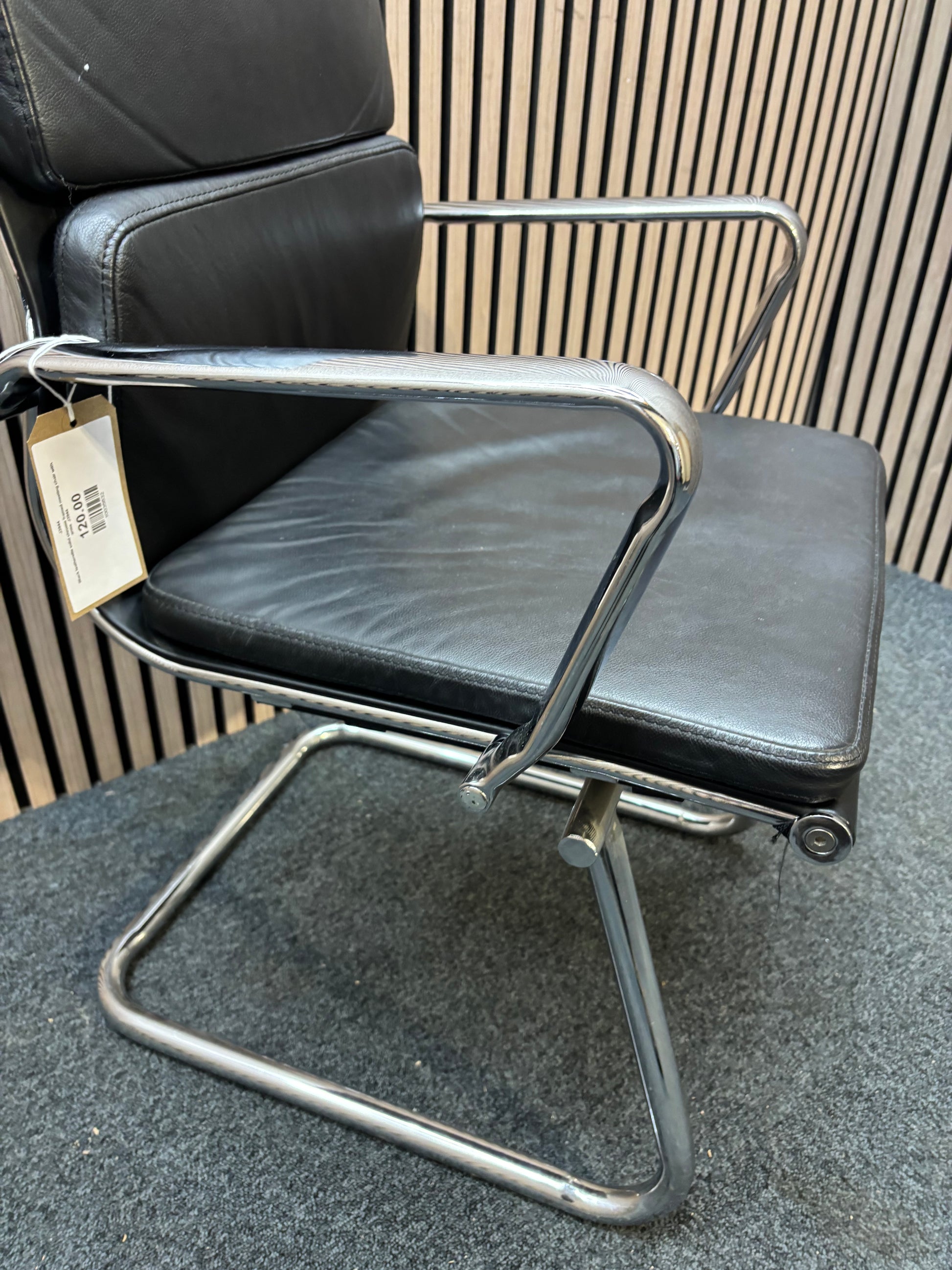 Black leatherette solid chrome framed meeting chair with arms J3944