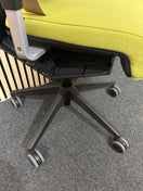 Actiu STAY multifunction swivel office chair with black mesh back and olive green seat fabric with height adjustable arms