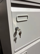 Tall 4 drawer grey metal individual locking filing cabinet 132Hx46Wx62D